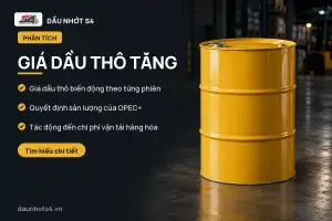 Giá dầu thô tăng: Thùng dầu màu vàng đứng trên nền sàn tối trong nhà kho.